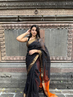 Handwoven Black & Rust Maheshwari Saree with Zari Border – Malhar Handloom